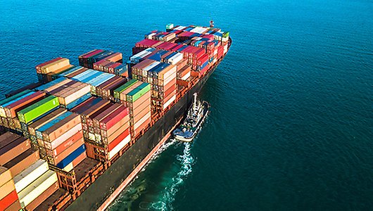 Ships with containers on open water